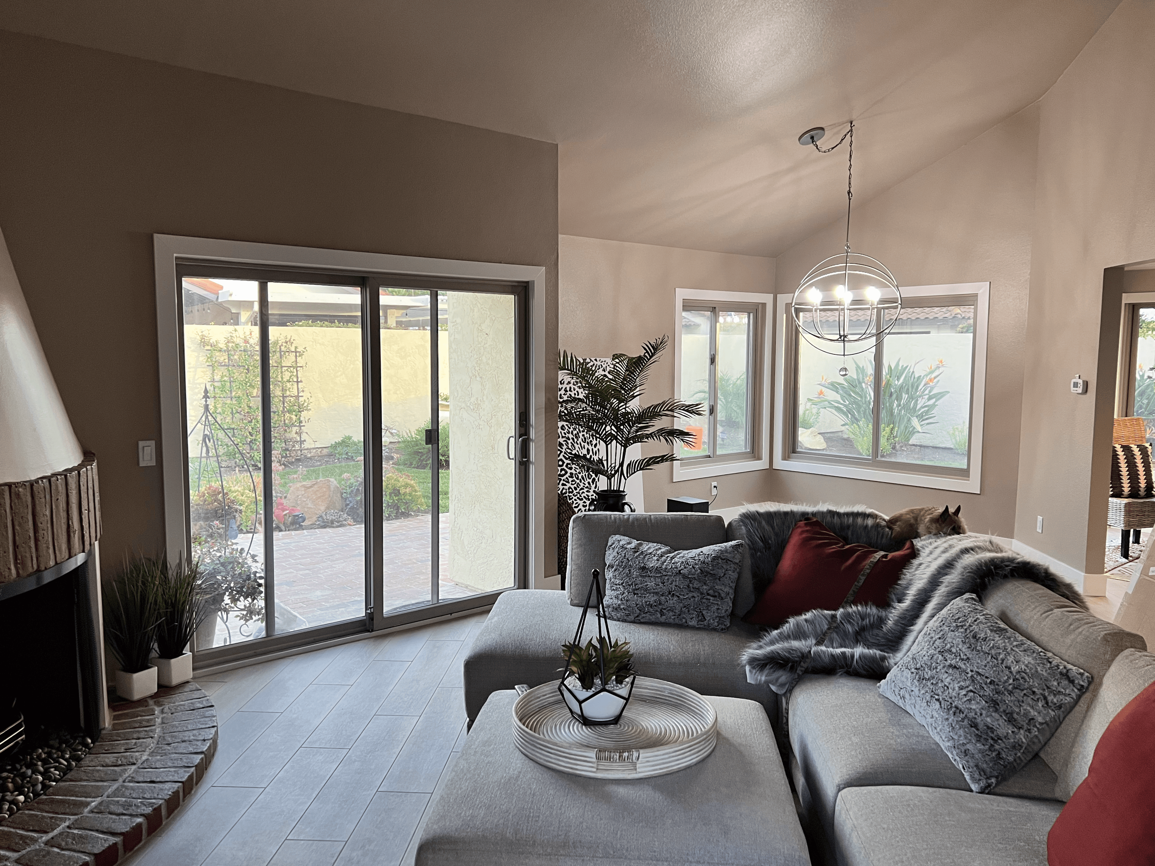 Bright modern living room with freshly painted walls and large sliding glass doors