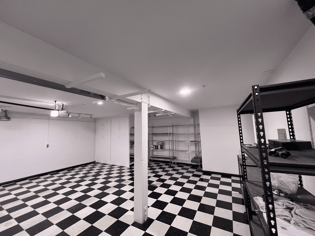 San Diego interior renovation with black and white checkered tile flooring and bright painted walls