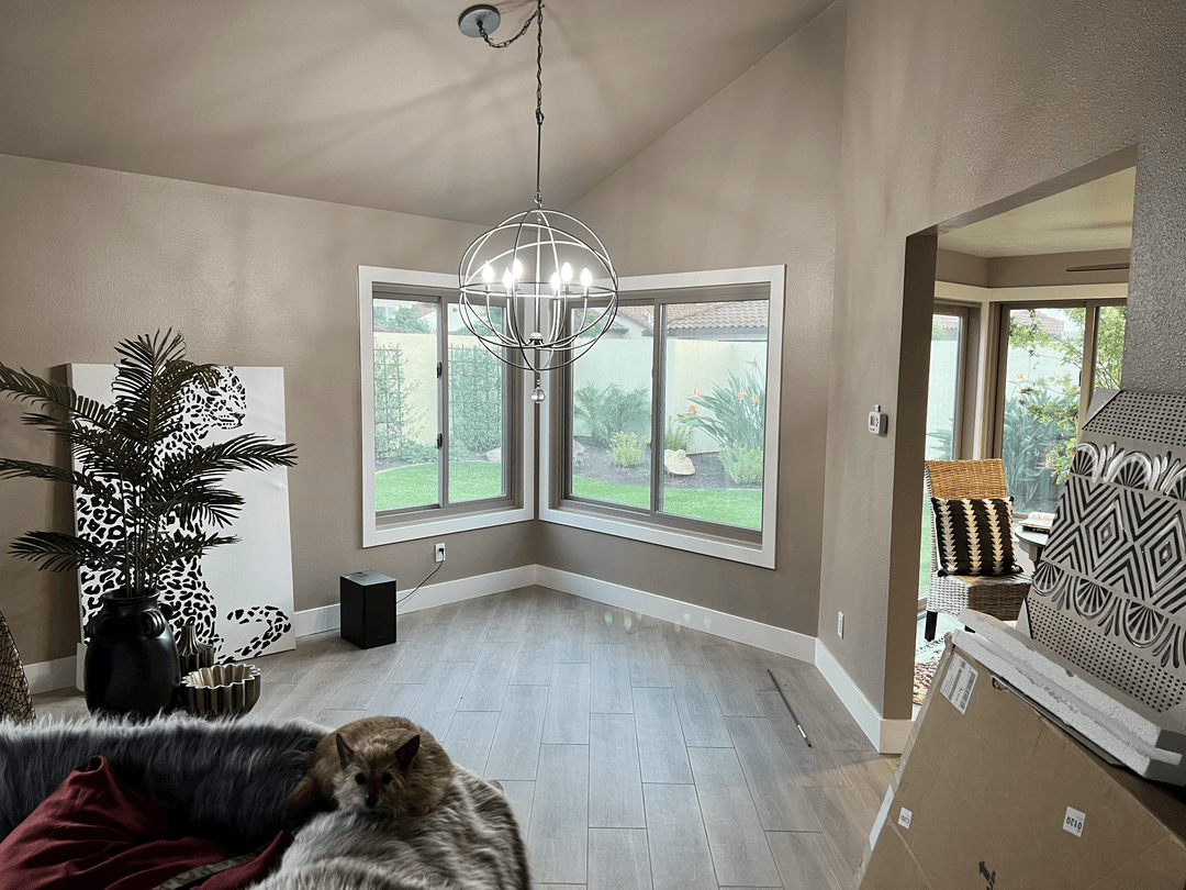 Living room with fireplace after professional interior painting